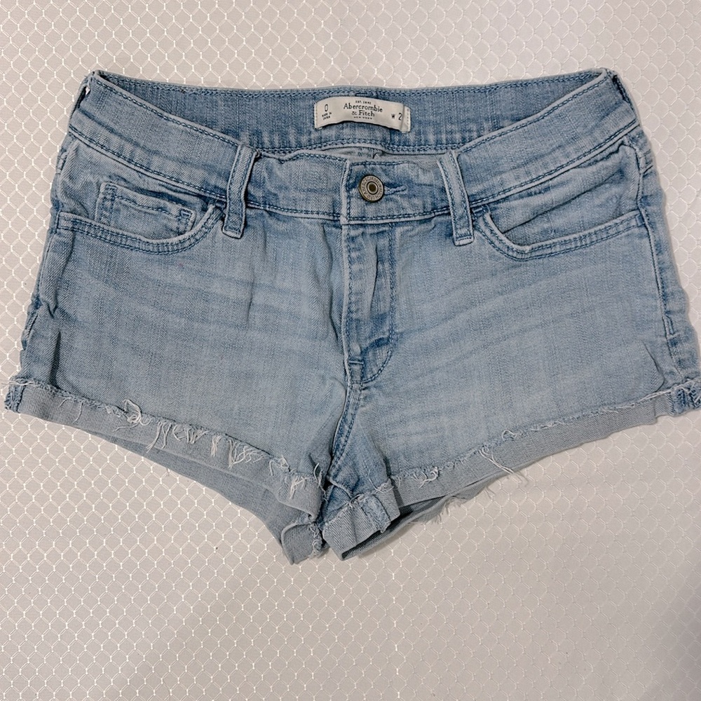 American Eagle Size 0 / 25 soft, light blue jean shorts. Frayed hem